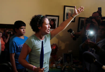 Maria Adilia Peralta, who according to local media was arrested for participating in a protest against Nicaraguan President Daniel Ortega's government, shouts slogans after being released from La Esperanza Prison, in Masaya, Nicaragua May 20, 2019.REUTERS/Oswaldo Rivas