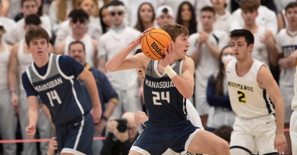 Manasquan Matt Solomon (No. 24) looks for an open player in second half action. Marlboro Boys Basketball defeats Manasquan 63-46 in Shore Conference Finals in Toms River on February 27, 2022.