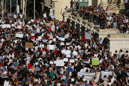 People protest against the assassination of investigative journalist Daphne Caruana Galizia last Monday, in Valletta, Malta, October 22, 2017. REUTERS/Darrin Zammit Lupi