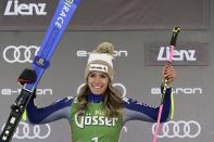 Italy's Marta Bassino celebrates her second place in an alpine ski, women's World Cup giant slalom, in Lienz, Austria, Saturday, Dec. 28, 2019. (AP Photo/Piermarco Tacca)