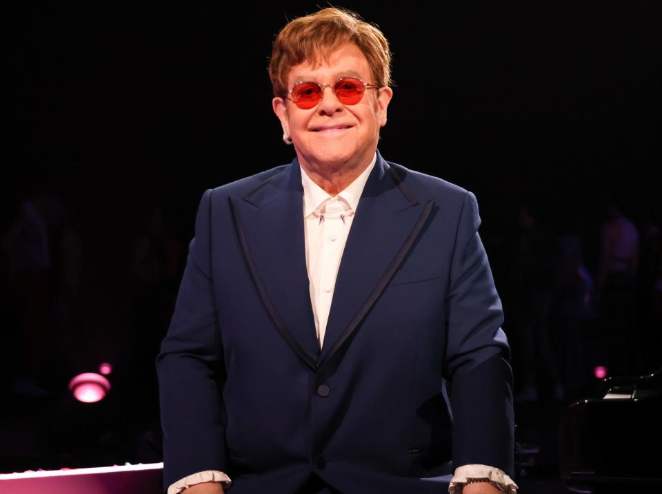 Elton smiles onstage