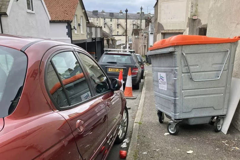 Parked up in a line of litter