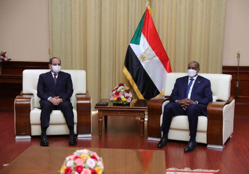 Sudan's Sovereign Council Chief General Abdel Fattah al-Burhan meets with Egyptian President Abdel Fattah al-Sisi, in Khartoum