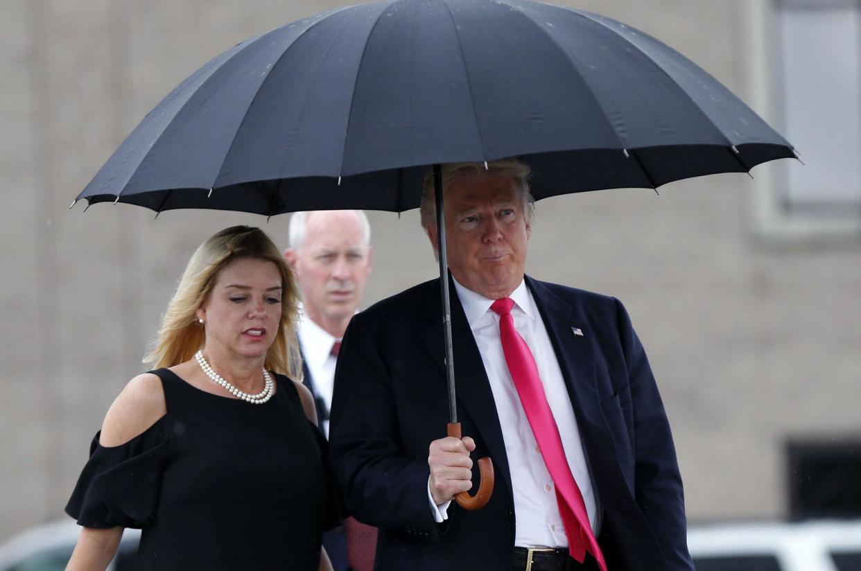 Florida Attorney General Pam Bondi with Donald Trump. She has vowed to send one of the packets to the White House after the case is over: (AP)