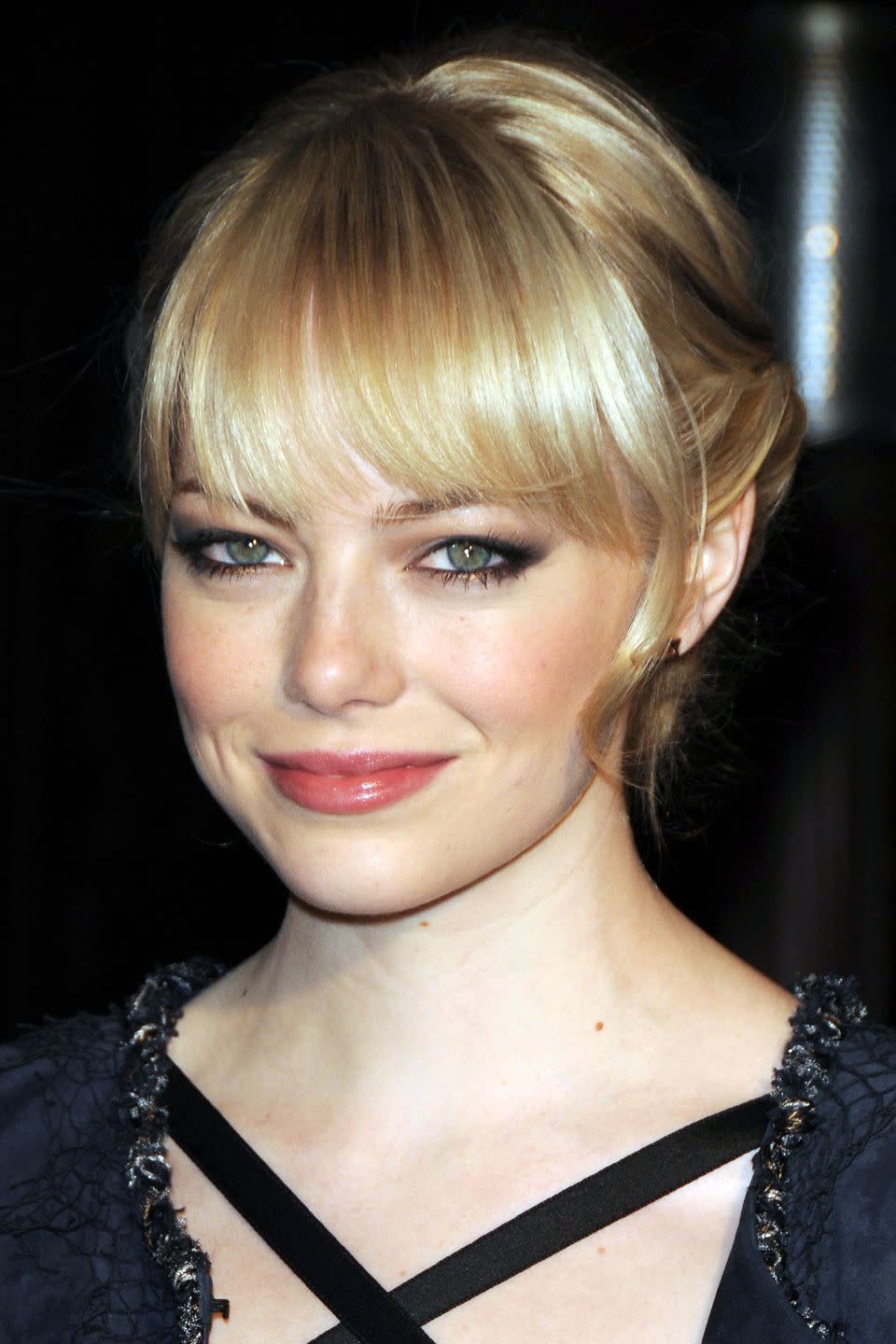 <p>Emma occasionally goes back to blonde, her real color, and while she experiments with tones and shades, it's this light honey hue that comes naturally.</p>