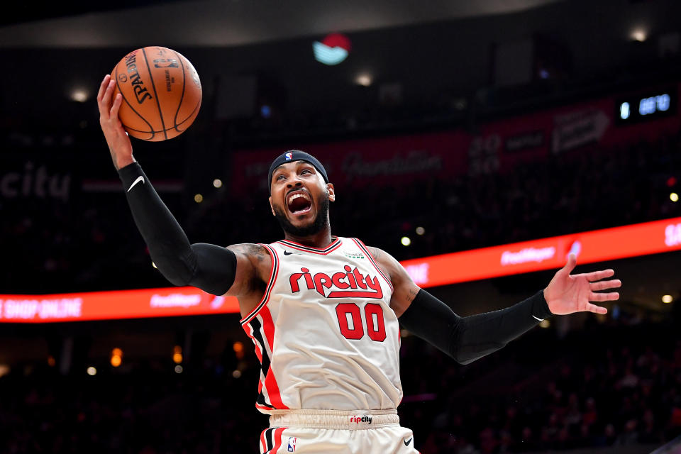 PORTLAND, OREGON - NOVEMBER 29: Carmelo Anthony #00 of the Portland Trail Blazers grabs a rebound during the second half of the game against the Chicago Bulls at the Moda Center on November 29, 2019 in Portland, Oregon.  The Trail Blazers won 107-103.  NOTE TO USER: User expressly acknowledges and agrees that, by downloading and or using this photograph, User is consenting to the terms and conditions of the Getty Images License Agreement.  (Photo by Alika Jenner/Getty Images)