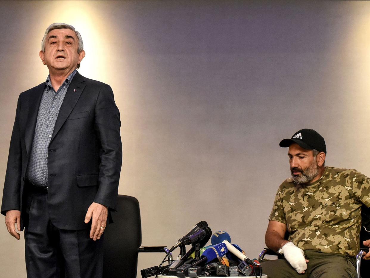 Serzh Sargsyan in a televised meeting with anti-government protest leader Nikol Pashinyan (VANO SHLAMOV/AFP/Getty Images)