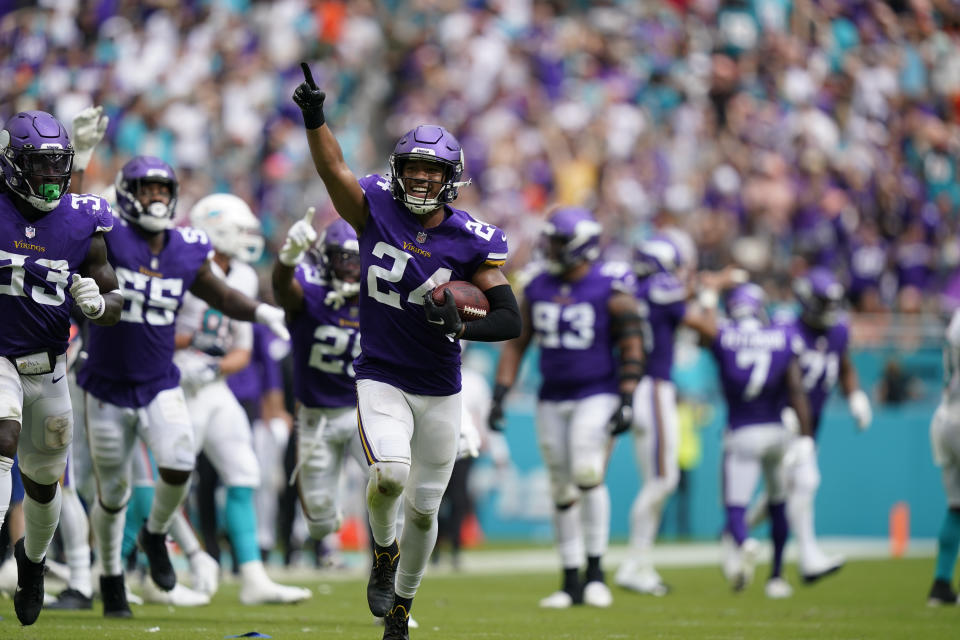Minnesota Vikings safety Camryn Bynum (24) celebrates a fumble recovery during the second half of an NFL football game against the Miami Dolphins, Sunday, Oct. 16, 2022, in Miami Gardens, Fla. (AP Photo/Lynne Sladky)
