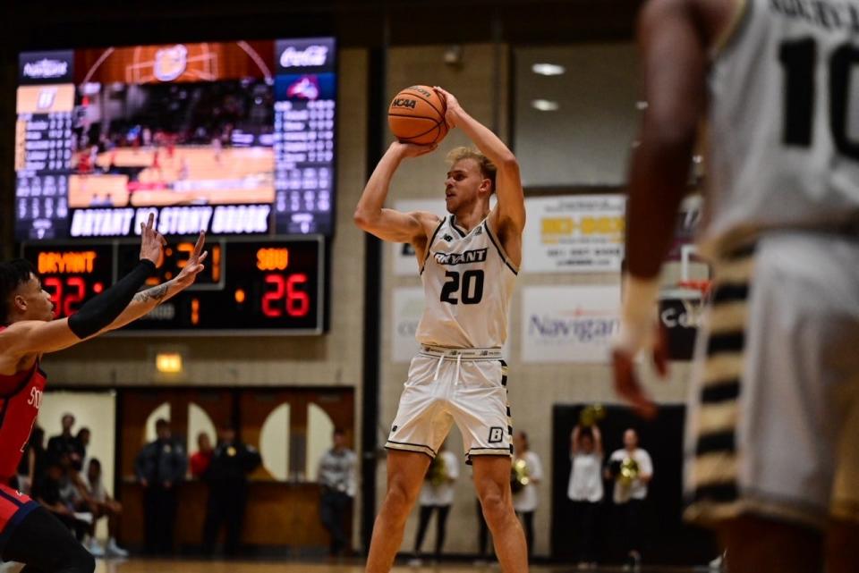 Bryant's Miles Latimer takes a shot Friday night against Stony Brook.