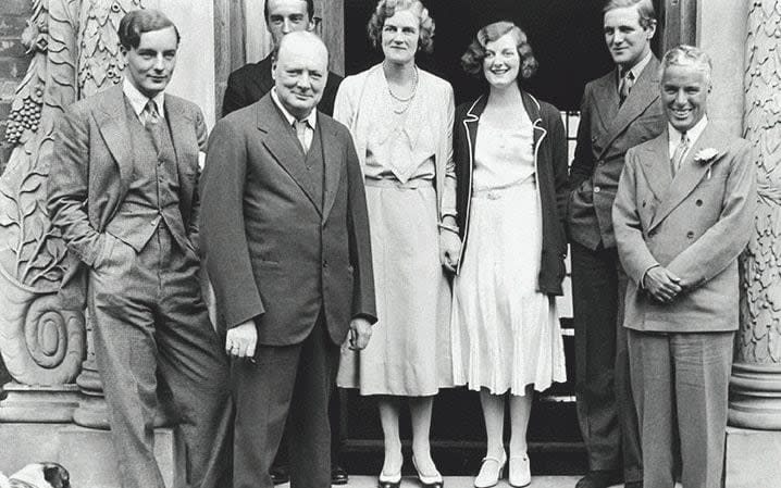 Churchill and his family (along with Charlie Chaplin, right) at Chartwell, 1953 -  Bridgeman Images