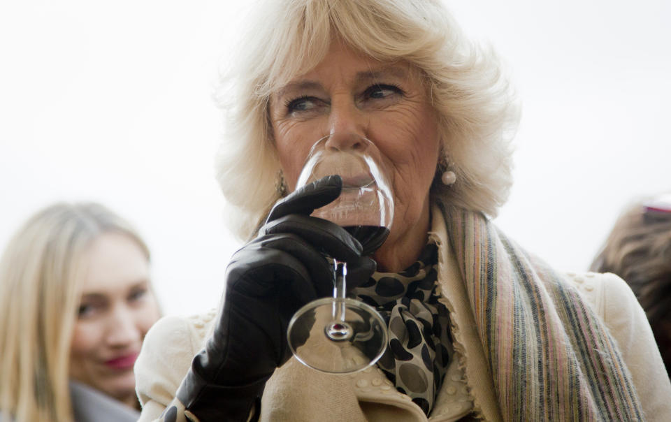 FILE - Camilla Duchess of Cornwall tastes wine in Osijek, Croatia, Tuesday, March 15, 2016. The royal couple is on official visits to Croatia, Kosovo, Montenegro and Serbia. (AP Photo/Almir Alic, File)