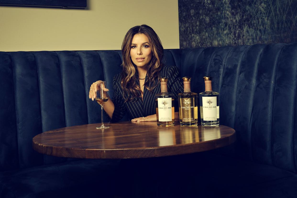 Eva Longoria with bottles of Casa Del Sol Tequila