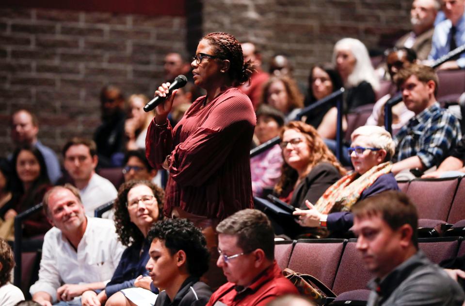 Missouri State Associate Professor Nicole West asks a question about academic tenure to John Jasinski, a finalist for the Missouri State University president job, during an open forum in the Plaster Student Union auditorium on Tuesday, Feb. 27, 2024.