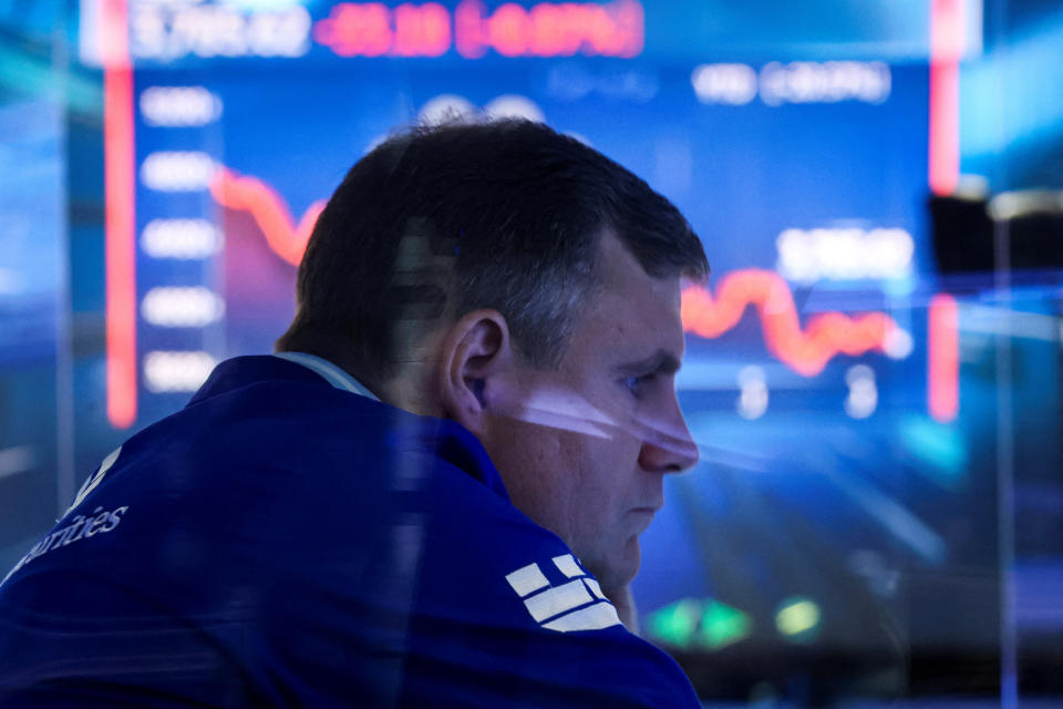 FTSE 100 A trader works on the floor of the New York Stock Exchange (NYSE) in New York City, U.S., July 13, 2022.  REUTERS/Brendan McDermid