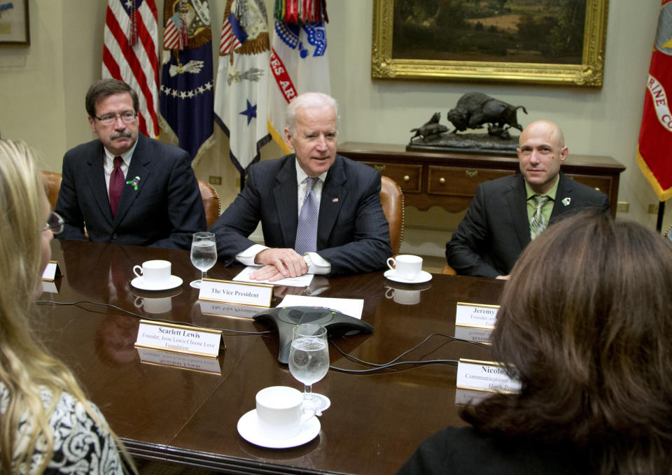 Vice President Joe Biden met with Newtown shooting family members, including Jeremy Richman (right), at the White House in December 2013 to discuss efforts to increase access to mental health services. (AP Photo/Carolyn Kaster) (Photo: ASSOCIATED PRESS)