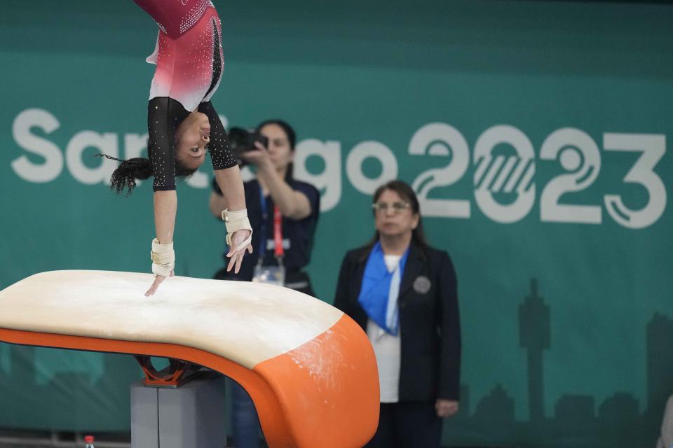 Peru's Ana Mendez competes on the vault during the women's team artistic gymnastics final round at the Pan American Games in Santiago, Chile, Sunday, Oct. 22, 2023. (AP Photo/Martin Mejia)