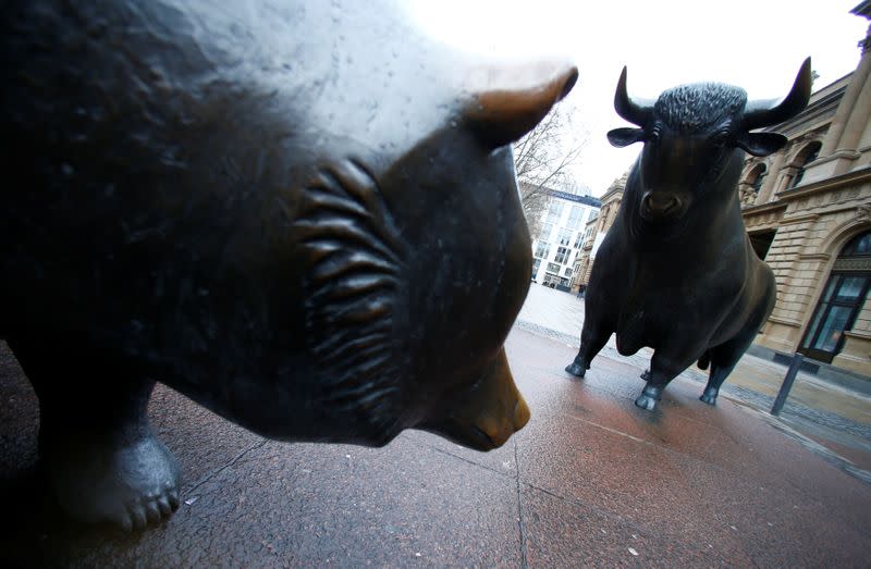 FILE PHOTO: Bull and bear statues are pictured outside Frankfurt's stock exchange