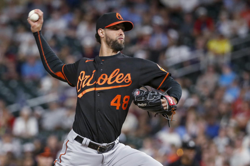 Baltimore Orioles relief pitcher Jorge Lopez throws to a Minnesota Twins batter during the ninth inning of a baseball game Friday, July 1, 2022, in Minneapolis. The Twins won 3-2. (AP Photo/Bruce Kluckhohn)