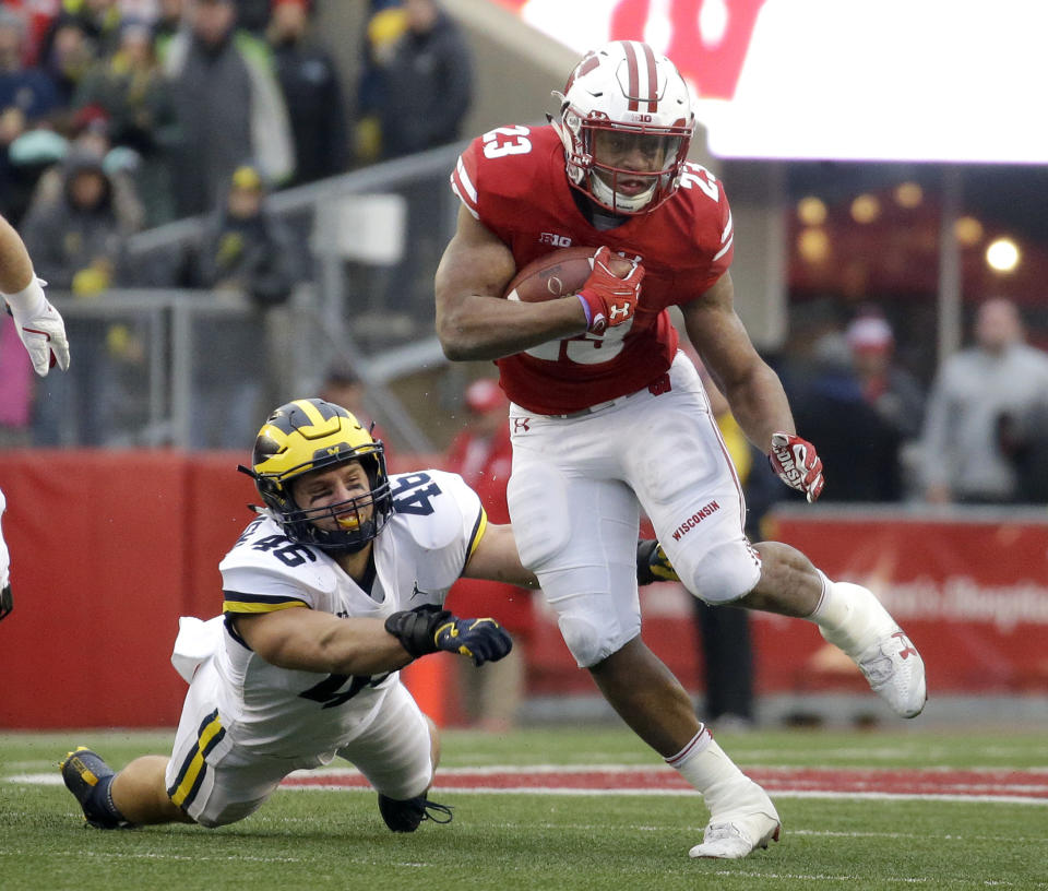 Wisconsin’s Jonathan Taylor ran for 1,977 yards to set the Bowl Subdivision freshman rushing record last season. (AP)