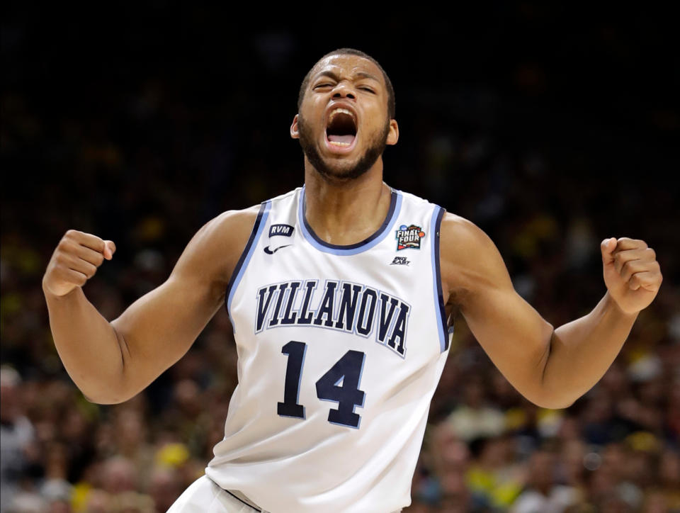 Villanova forward Omari Spellman celebrates during the first half against Kansas in the semifinals of the Final Four NCAA college basketball tournament, Saturday, March 31, 2018, in San Antonio. (AP Photo/Eric Gay)