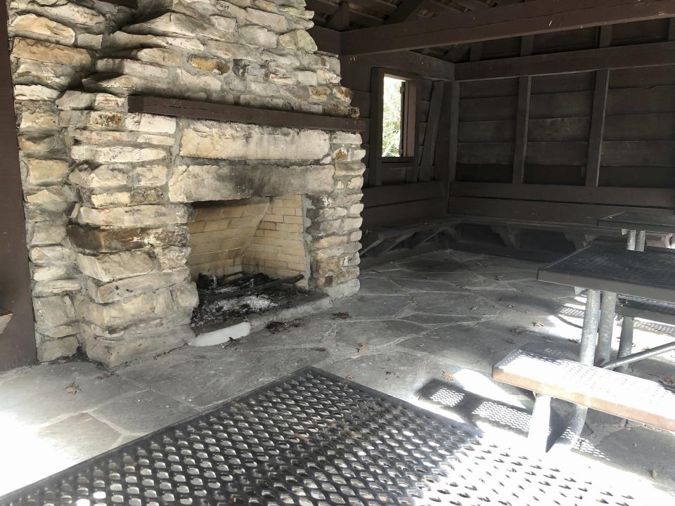 A repaired fireplace in a picnic shelter originally built by the Civilian Conservation Corps before World War II is shown Wednesday, Oct. 27, 2021, at a national park visitor center in Grandview, W.Va. Under legislation passed by Congress in 2020, some of America's most spectacular natural settings are getting a makeover. (AP Photo/John Raby)