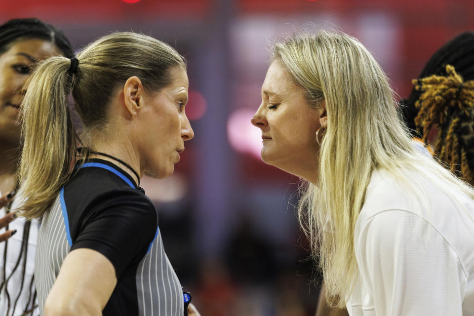 Tennessee head coach Kellie Harper, right, expresses her displeasure to official Karen Preato late in the second half of a second-round college basketball game against North Carolina State in the NCAA Tournament in Raleigh, N.C., Monday, March 25, 2024. (AP Photo/Ben McKeown)