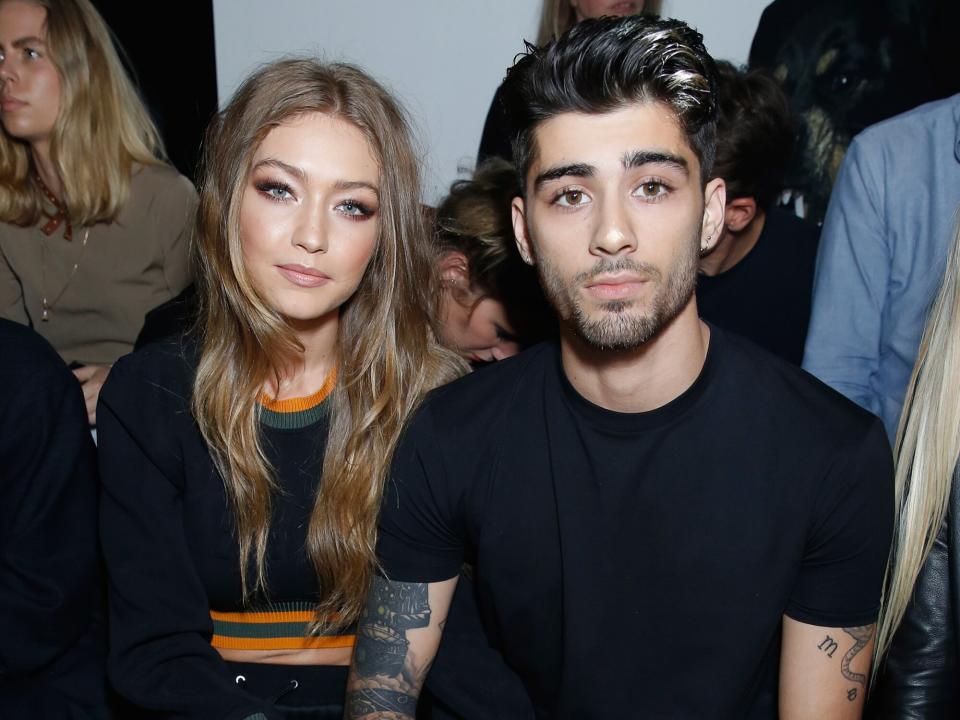 Gigi Hadid and Zayn Malik attend the Versus Versace show during London Fashion Week Spring/Summer collections 2016/2017 on September 17, 2016 in London, United Kingdom