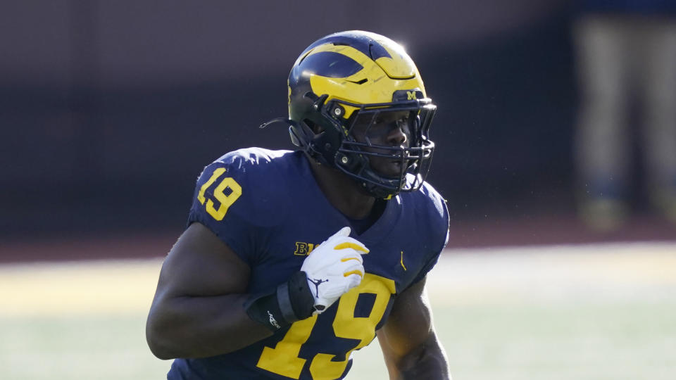 Michigan defensive lineman Kwity Paye only suited up for four games in 2020 but turned in a strong performance. (AP Photo/Carlos Osorio)