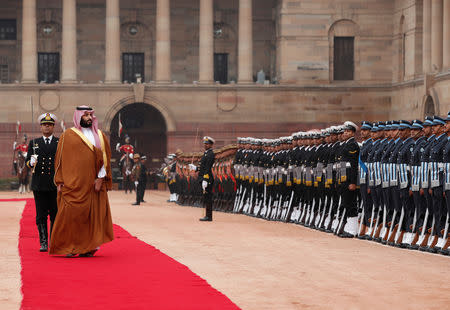 Saudi Arabia's Crown Prince Mohammed bin Salman inspects an honour guard during his ceremonial reception at the forecourt of Rashtrapati Bhavan in New Delhi, India, February 20, 2019. REUTERS/Adnan Abidi
