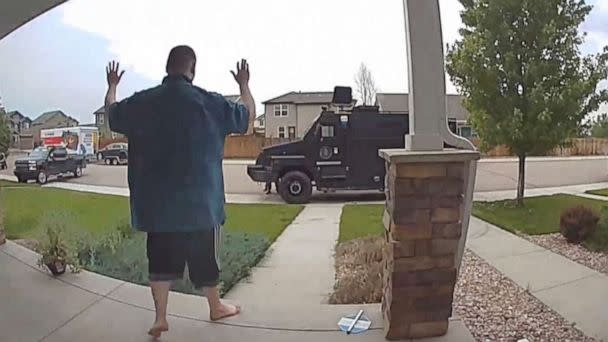 PHOTO: In this image from video provided by Leslie Bowman, Anderson Lee Aldrich surrenders to police at a home where his mother, Laura Voepel, was renting a room in Colorado Springs, Colo., June 18, 2021.  (Leslie Bowman via AP)