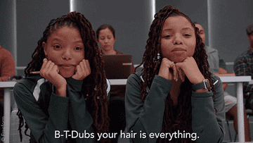 two students saying, b-t dubs, your hair is everything