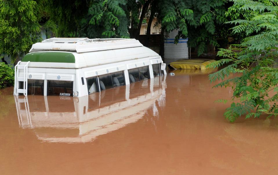 A vehicle submerged in water outside Baltana police post after Sukhna lake swelled and floodgates were opened during a heavy rain spell, on August 22, in Zirakpur, on August 23, 2020 inChandigarh, India. (Photo by Keshav Singh/Hindustan Times via Getty Images)