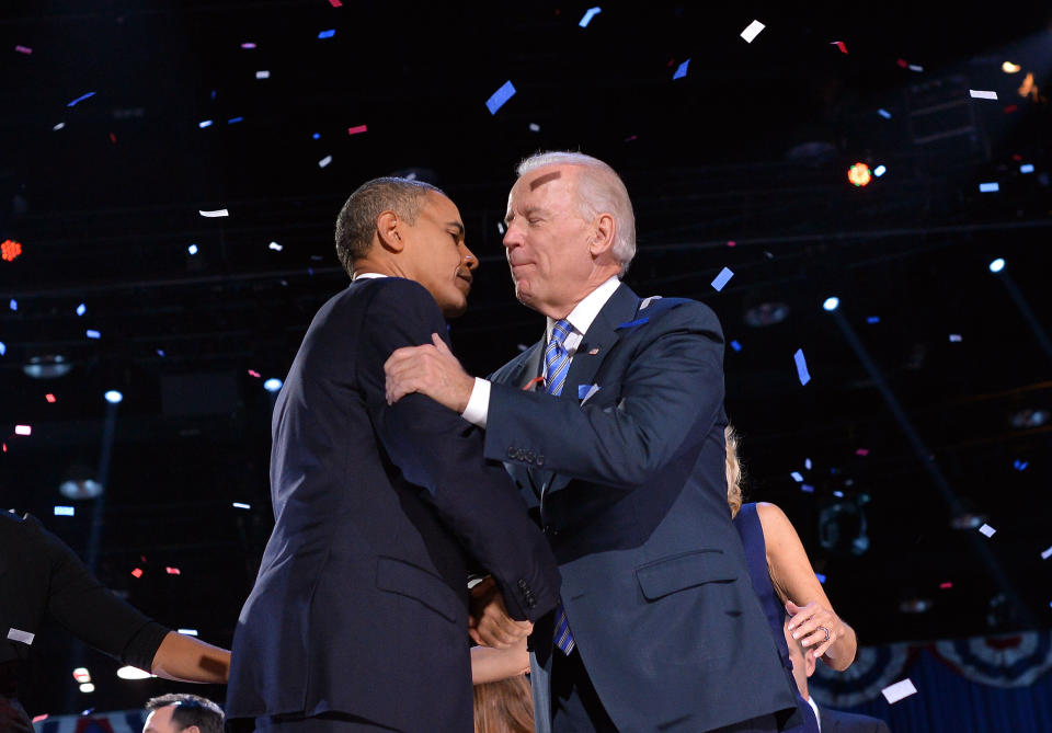 US President Barack Obama (L) shakes hands with Vice President Joe Biden on stage after delivering his victory speech in Chicago on November 7, 2012. Obama swept to re-election, forging history again by transcending a slow economic recovery and the high unemployment which haunted his first term to beat Republican Mitt Romney. AFP PHOTO/Jewel SAMAD        (Photo credit should read JEWEL SAMAD/AFP/Getty Images)