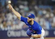 Toronto Blue Jays relief pitcher Anthony Bass works against the Milwaukee Brewers during the ninth inning of a baseball game Wednesday, May 31, 2023, in Toronto. (Frank Gunn/The Canadian Press via AP)