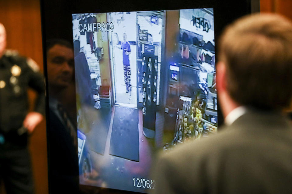 Jessica Chambers is seen in video from a security camera at the M&M convenience store on the day she died during testimony on the fifth day of the retrial of Quinton Tellis on Saturday, Sept. 29, 2018, in Batesville, Miss. Tellis is being retried on capital murder charges in the 2014 death of Chambers after a jury couldn't reach a verdict in Tellis' first trial last year. (Brad Vest/The Commercial Appeal via AP, Pool)