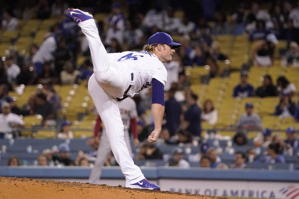 Los Angeles Dodgers relief pitcher Craig Kimbrel throws to the plate during the ninth inning of a baseball game against the Arizona Diamondbacks Monday, Sept. 19, 2022, in Los Angeles. (AP Photo/Mark J. Terrill)