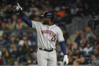 Houston Astros Yordan Alvarez (44) reacts after scoring against the New York Yankees during the third inning of Game 4 of an American League Championship baseball series, Sunday, Oct. 23, 2022, in New York. (AP Photo/Seth Wenig)