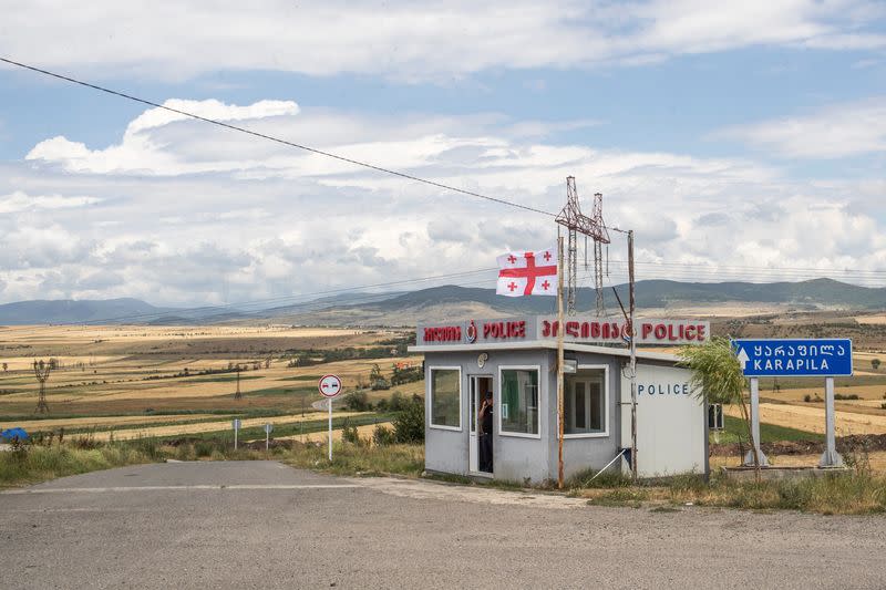 The Wider Image: Bordering Georgia's breakaway regions, villagers fear Russia's next steps