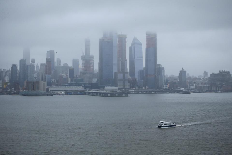 <p>A NY Waterway ferry sails on the Hudson River as the winter storm Quinn approaches New York City on March 7, 2018, in Weehawken, New Jersey. This is the second nor’easter to hit the area within a week and it is expected to bring heavy snowfall and winds, raising fears of another round of electrical outages. (Photo: Kena Betancur/Getty Images) </p>