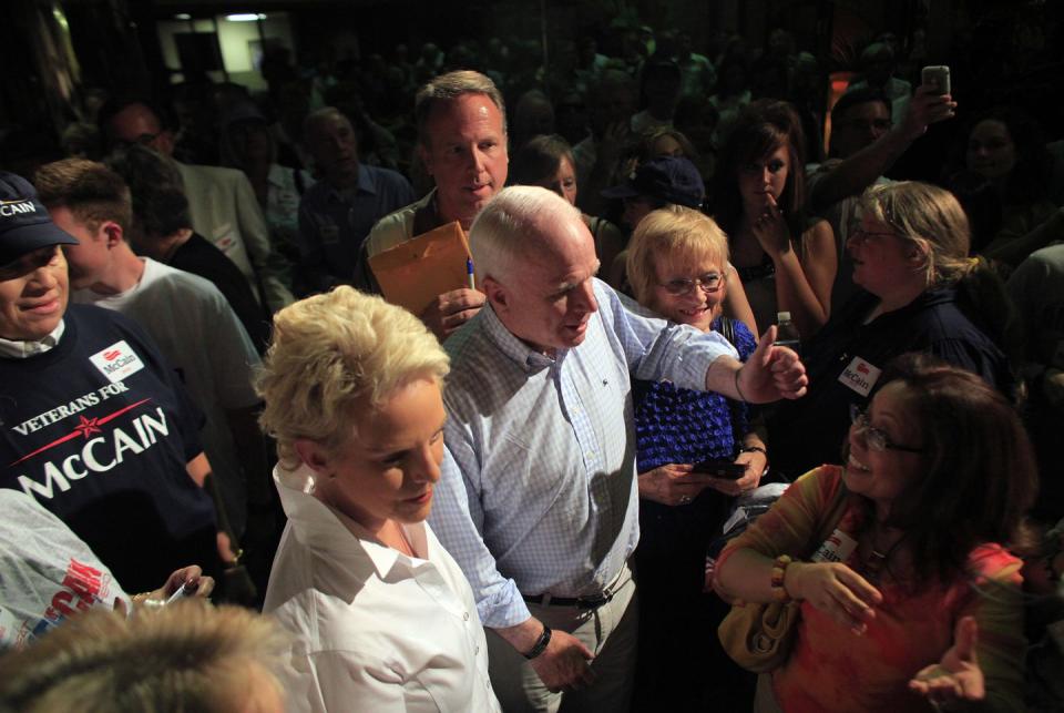 <p>McCain and his wife Cindy greet supporters during a visit to a campaign office one day before Arizona's primary election on August 23, 2010 in Phoenix, Arizona. </p>