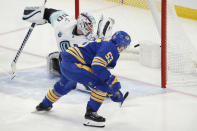 Buffalo Sabres left wing Jeff Skinner (53) puts the puck past Seattle Kraken goaltender Chris Driedger (60) during the third period of an NHL hockey game, Monday, Nov. 29, 2021, in Buffalo, N.Y. (AP Photo/Jeffrey T. Barnes)