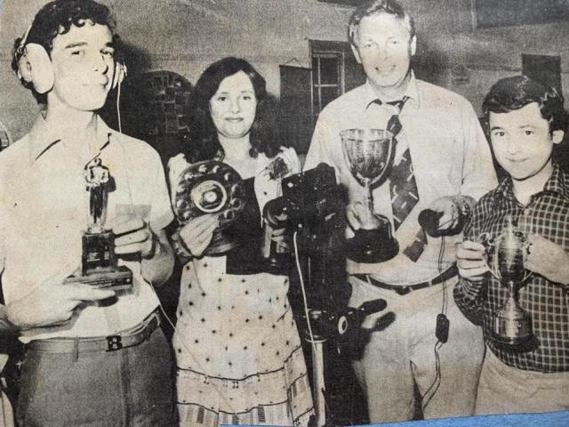 Watford Observer: Barry Saunders, Lesley, Richard Griffin and Graeme Robson with WCS awards, 1979. 'Harvest' was awarded the HACCA trophy, the Hammond trophy and the Watford Circle Plaque. Image: Watford Observer.