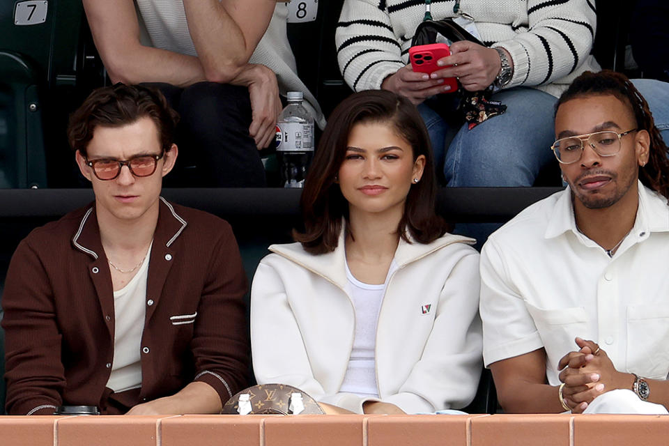 INDIAN WELLS, CALIFORNIA - MARCH 17: Tom Holland and Zendaya watches Carlos Alcaraz of Spain play Daniil Medvedev of Russia during the Men's Final of the BNP Paribas Open at Indian Wells Tennis Garden on March 17, 2024 in Indian Wells, California. (Photo by Matthew Stockman/Getty Images)