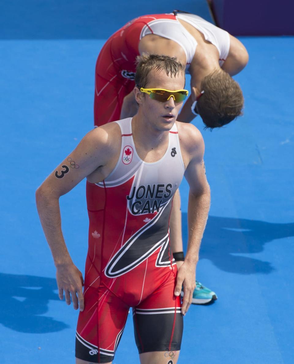 Canada's Kyle Jones, front and Brent McMahon complete the men's triathlon at the 2012 London Olympics, August 7, 2012. Jones placed 25th and McMahon 27th. THE CANADIAN PRESS/HO, COC - Jason Ransom