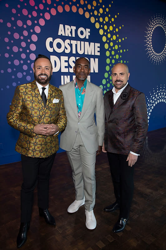 FIDM Fashion Design Co-Chairs Nick Verreos and David Paul flank Oscar-nominated costume designer Paul Tazewell at the opening of the &#x00201c;Art of Costume Design in Film&#x00201d; exhibition at the FIDM Museum, Fashion Institute of Design &amp; Merchandising, in Los Angeles on March 12, 2022. - Credit: Alex J. Berliner/ABImages