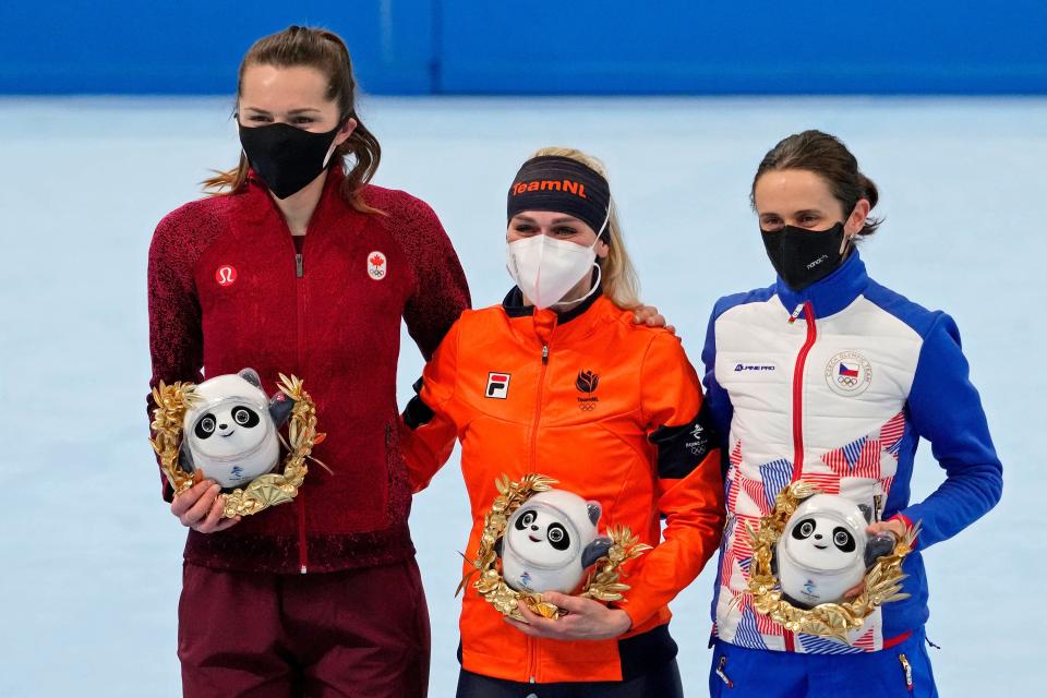 Isabelle Weidemann (CAN) and Irene Schouten (NED) and Martina Sablikova (CZE) pose for a photo during the medal ceremony after the women's 5000m during the Beijing 2022 Olympic Winter Games at National Speed Skating Oval on Feb 10, 2022. Irene Schouten (NED) won in a new olympic record.