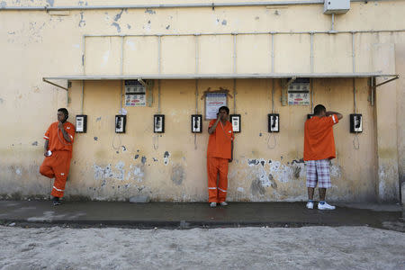 FILE PHOTO: Inmates speak on phones at the Topo Chico prison during a media tour, in Monterrey, Mexico, February 17, 2016. REUTERS/Daniel Becerril/File Photo