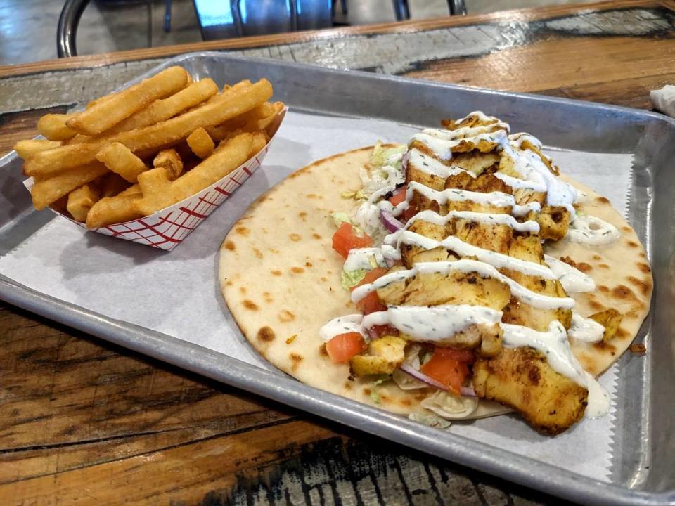 The Monica, chicken shawarma, tomato, onion, lettuce and yogurt sauce on pita, is one of the new seasonal offerings at The Old Bakery Beer Company in Alton.