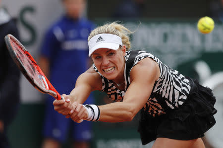 Angelique Kerber of Germany returns the ball to Kiki Bertens of the Netherlands during the French Open May 24, 2016. REUTERS/Benoit Tessier