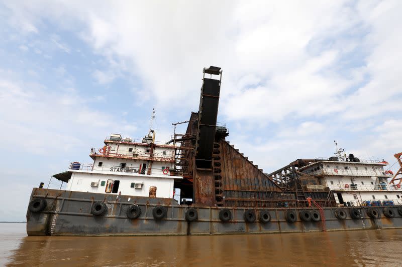 Star Optimus, a hopper dredger vessel that belongs to Starhigh Asia Pacific, sits docked on the Salween river in Mawlamyine